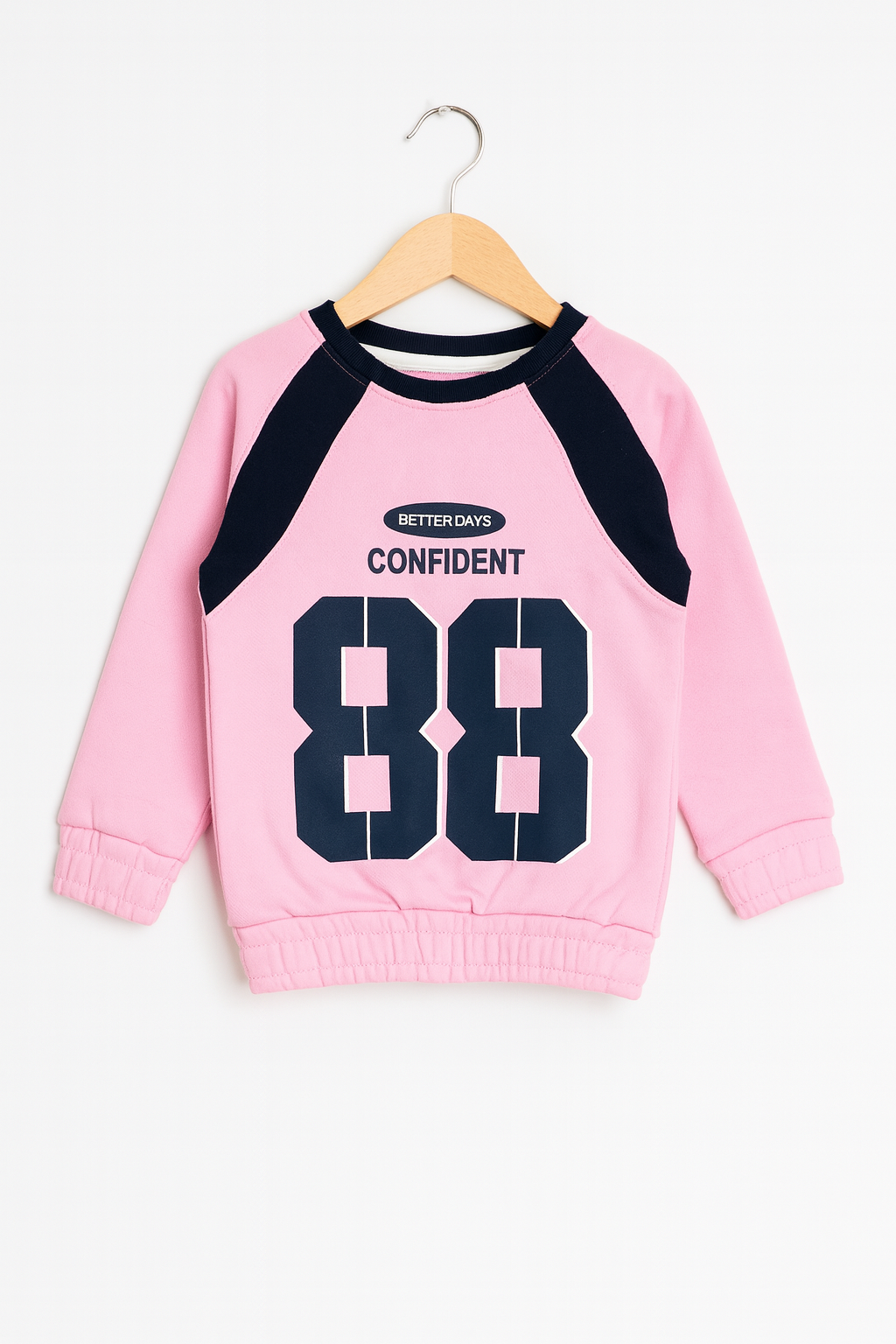 Confident 88 Kids Tracksuit sweatshirt in pink with navy accents and bold print.